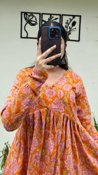 Katha Cotton Orange Flared Floral Print Aliacut Peplum Top - Dolled Up
