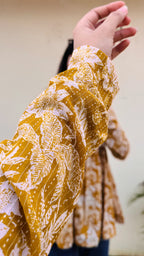 Katha Cotton Yellow Flared Floral Print Aliacut Peplum Top - Dolled Up