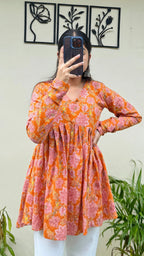 Katha Cotton Orange Flared Floral Print Aliacut Peplum Top - Dolled Up